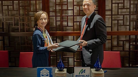 Metrobank Institutional Banking Sector Head Mylene Caparas (left) and Maynilad Chief Operating Officer Randolph T. Estrellado pose for a photo at the signing of Maynilad’s Php10-billion loan with Metrobank to fund capex projects that will improve water service coverage and availability.