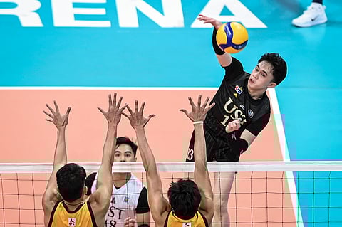 Josh Ybañez fires a shot that helped UST get past FEU, 25-23, 25-19, 28-26, in their UAAP Season 86 men’s volleyball Final Four game Sunday at the Mall of Asia Arena.