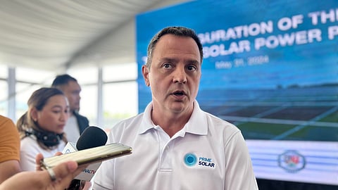 Prime Infra president and CEO Guillaume Lucci speaks to reporters at the sidelines of the inauguration of the 64-megawatt solar plant in Tanauan, Batangas.