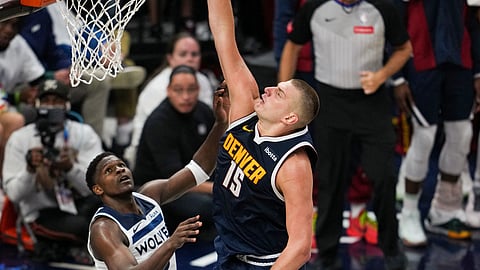NIKOLA Jokic muscles his way to a 35-point effort during the Denver Nuggets’ 115-107 win over the Minnesota Timberwolves in Game 4 of their NBA Western Conference playoff series.