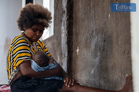 TRIBUNE-motherbreastfeedingagta