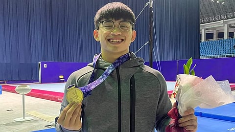 Carlos Yulo beams with pride after winning the individual all-around gold medal in the 2024 AGU Artistic Gymnastics Asian Championships on Thursday in Tashkent, Uzbekistan.