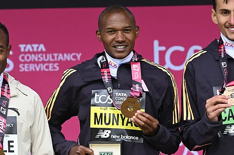 Winner of the men's race, Kenya's Alexander Mutiso Munyao poses with his medal at the presentation for the 2024 London Marathon in central London on 21 April 2024.