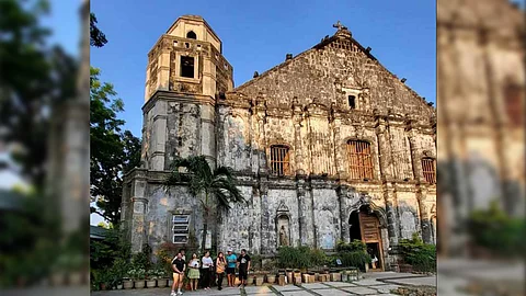 Pause for prayer: St. James the Great Parish Church in Bolinao was where the first mass was held in the Philippines.