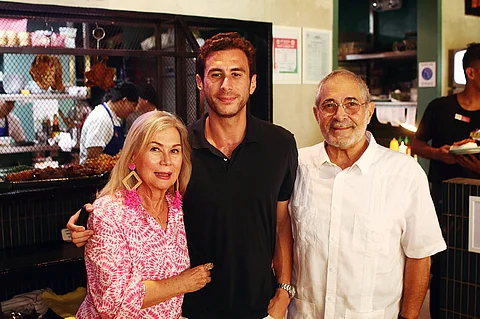 ENTREPRENEURIAL family: Felix Assad (center) with mom Vicky and dad Joe.