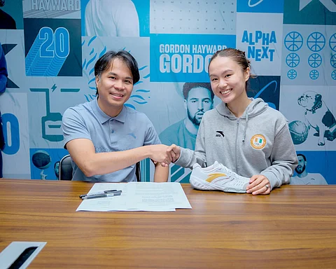 MAXINE Esteban (right) will stay with the ANTA family after renewing her deal with ANTA Philippines general manager JP Paglinawan during a contract-signing last Thursday.