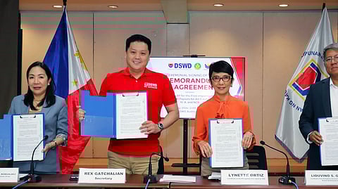 Department of Social Welfare and Development Secretary Rex T. Gatchalian (2nd from left) and LandBank president and CEO Lynette V. Ortiz (3rd from left) lead the signing of a Memorandum of Agreement for the improved payouts under the Assistance to Individuals in Crisis Situation Program on 21 May 2024 at the DSWD Central Office in Quezon City, with witnesses DSWD Undersecretary Monina Josefina H. Romualdez (leftmost) and LandBank executive vice president Liduvino S. Geron (rightmost). The partnership aims to facilitate the efficient and timely delivery of financial aid to crisis-affected individuals in need of essential support services.