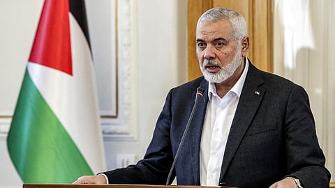 Ismail Haniyeh, the Doha-based political bureau chief of the Palestinian Islamist movement Hamas, speaks to the press after a meeting with the Iranian foreign minister in Tehran on 26 March 2024. Haniyeh's visit to Tehran comes a day after a resolution adopted by the UN Security Council called for an "immediate ceasefire" for the ongoing Muslim holy month of Ramadan, leading to a "lasting" truce.
