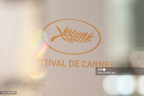 A photo shows the festival logo during a press conference to announce the official selection of the 77th edition of the Cannes Film Festival, at the UGC Normandie cinema in Paris, on 13 April 2024. Artificial intelligence, QRCode, call buttons: the security of the 77th Cannes Film Festival will be imbued with technology with experimental devices at a time when the vigipirate plan is at its maximum level, less than three months before the Olympic Games.