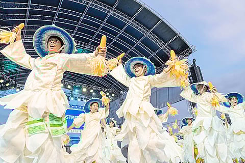Contingents from different barangays of the City of Ilagan, Isabela perform street dance at the Ilagan Sports Complex on 10 May.