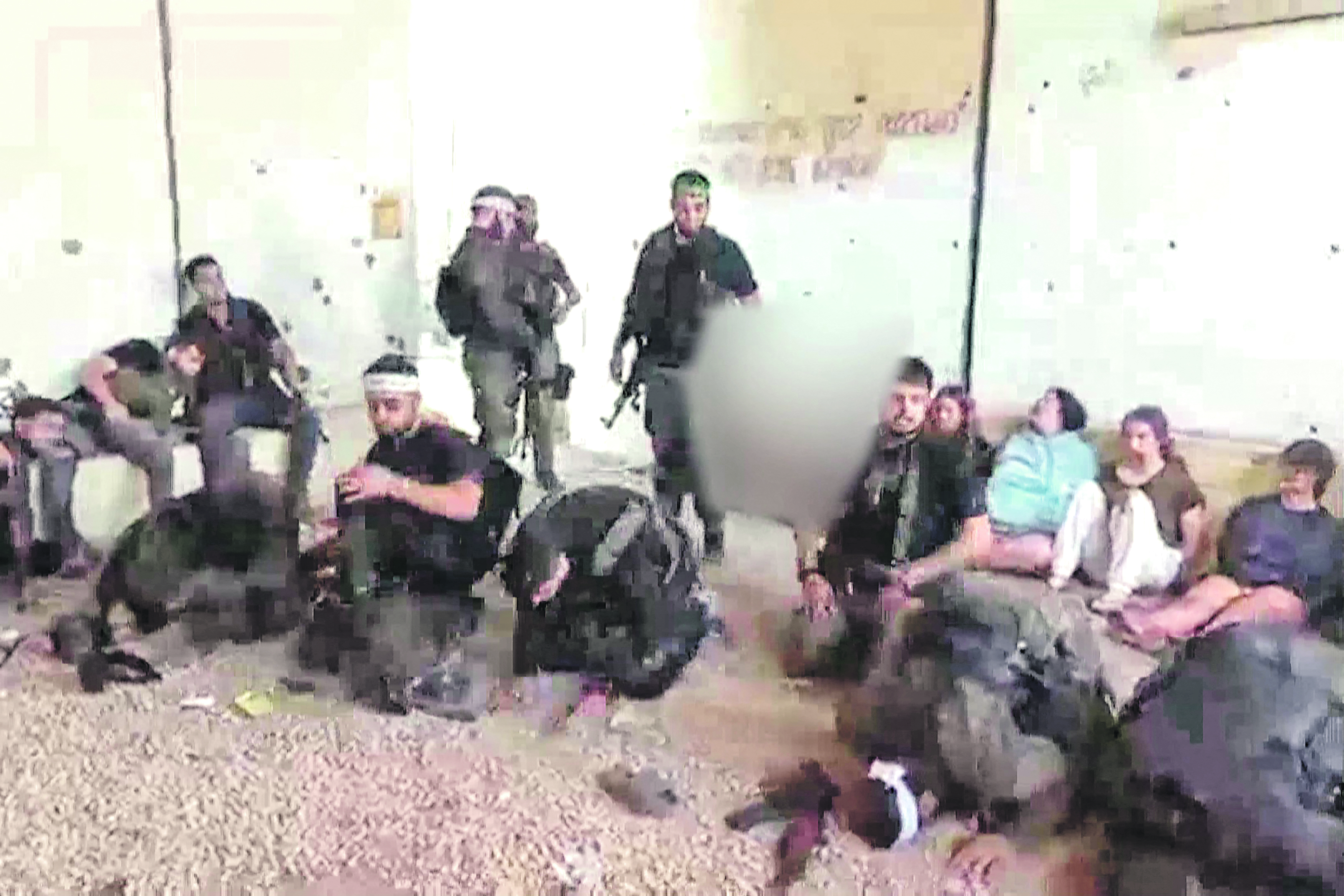 FIVE Israeli female soldiers (right) are held captive by Palestinian Hamas terrorists during the 7 October 2023 attack on Israel.