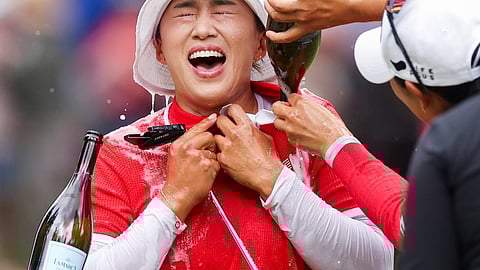 AMY Yang gets a victory shower after conquering the 2024 KPMG Women’s PGA Championship at Sahalee Country Club.