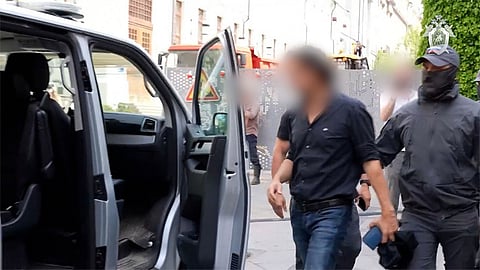 Laurent Vinatier being arrested