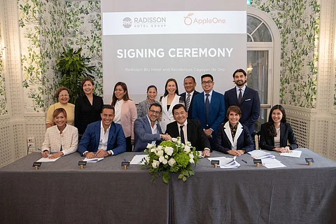 (SEATED) Christine Angela Sevilla, director, Development, Philippines, Radisson Hotel Group; Ramzy Fenianos, chief development officer, APAC, Radisson Hotel Group; Elie Younes, executive vice president and global chief development officer, Radisson Hotel Group; Ray Go Manigsaca, president and chief executive officer, AppleOne Group; Venus Manigsaca, chairman, AppleOne Group; Samantha Manigsaca, AVP for Hospitality, AppleOne Group.