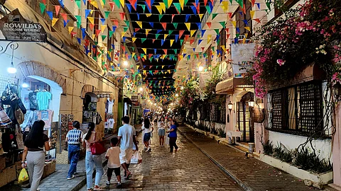 Tourists continue to flock to Calle Crisologo in the heritage core of Vigan City in May 2024.