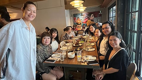 Woman of the Hour Jo Ann Bitagcol with some members of the press.