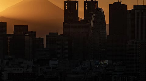 A property firm in Tokyo has decided to demolish a near-complete block of flats after neighbours complained that it blocked the view of Mount Fuji