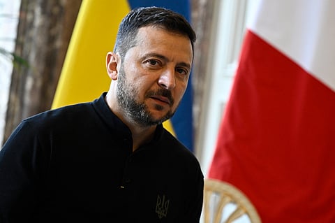 Ukraine’s President Volodymyr Zelensky poses prior to address the French National Aassembly as part of his visit to France, in Paris on June 7, 2024.