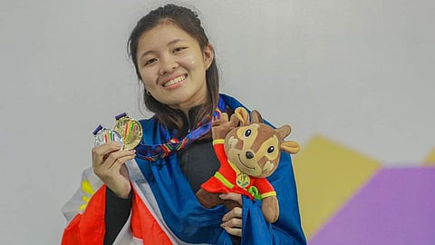 Samantha Catantan receives expert advice from one of Philippine fencing’s biggest names.