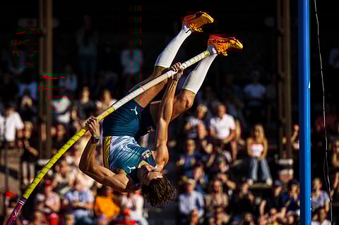 ARMAND Duplantis soars to a six-meter mark to win the gold medal in the men’s pole vault event of the Diamond League meet in Stockholm.
