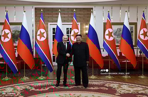 RUSSIA’s President Vladimir Putin (left) shakes hands with North Korea’s leader Kim Jong Un during a meeting in Pyongyang on 19 June 2024. Putin enjoyed a red carpet welcome, a military ceremony and an embrace from Kim during the state visit.