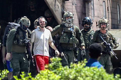 (FILES) Israeli hostage Andrei Kozlov, 27, disembarks with soldiers from an air force CH-53 Sea Stallion military helicopter which landed in the grounds of the Sheba Tel-HaShomer Medical Centre, after his rescue by the Israeli army from captivity in the Gaza Strip, in Ramat Gan near Tel Aviv on June 8, 2024, amid the ongoing conflict in the Palestinian territory between Israel and the militant group Hamas.