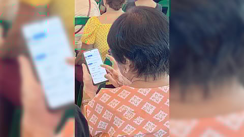 SENIOR citizen uses the KonsultaMD app as lecturer Dr. Hazel Fajardo guides them how to schedule an appointment for online medical consultation during the #SeniorDigizen workshop.