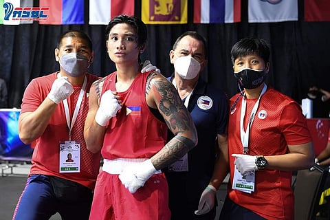 Hergie Bacyadan (second from left) punches her way closer to a slot in the 2024 Paris Olympics after beating Hungarian Veronika Nakota in the 2nd World Olympic Qualifying Tournament in Bangkok.