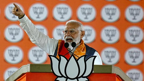 Narendra Modi, India's Prime Minister and leader of the ruling Bharatiya Janata Party (BJP), addresses his supporters in Hyderabad on 10 May 2024.