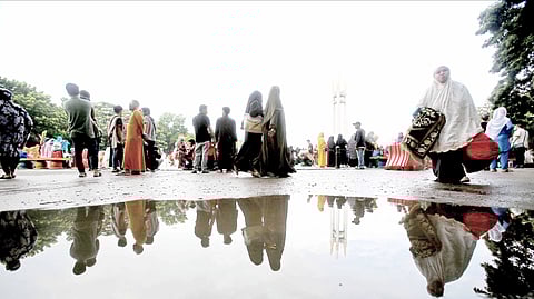 Mirroring deep faith Muslims gather Sunday morning at the Quezon Memorial Circle to commemorate the Eid-al Adha, or the Feast of the Sacrifice, recognizing the willingness of the prophet Ibrahim to slaughter his only son as demanded by God. Ibrahim, or Abraham in Christian texts, was ordered instead to sacrifice an animal in lieu of his son, Ishmael.