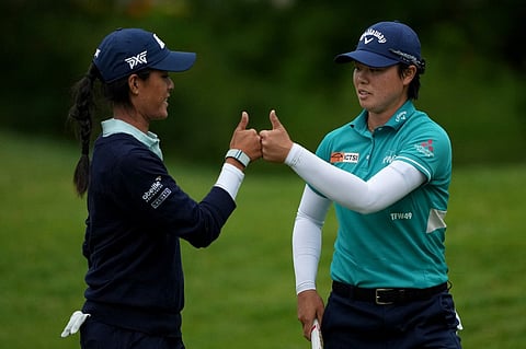 CELINE Boutier and Yuka Saso flash the thumbs-up signs after matching the tournament’s four-ball record of 12-under-par 58 during the second round of the Dow Championship at Midland Country Club in Midland, Michigan on 28 June.