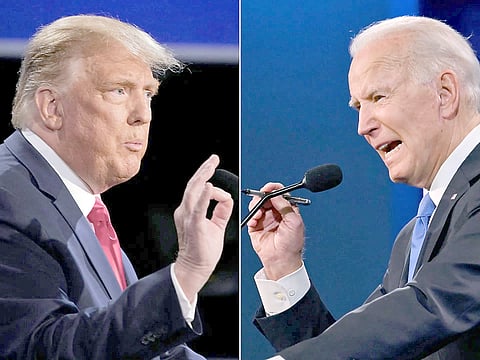 THEN United States President Donald Trump (left) and then Democratic former Vice President Joe Biden in the final presidential debate at Belmont University in Nashville, Tennessee on 22 October 2020.