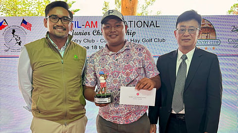 DAVID Charles Serdeña emerges triumphant in the Fil-Am Invitational Junior Championship at the Baguio Country Club (BCC). Also shown are Camp John Hay Golf Club general manager Jude Eustaquio and BCC representative Danny Gacuyan.