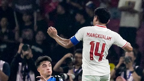 DYLAN Demuynck (left) of the Philippines challenges Asnawi Mangkualam Bahar of Indonesia for possession during their 2026 FIFA World Cup Asia Qualifiers match in Jakarta. The Indonesians prevailed 2-0.