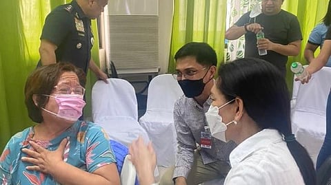 Senator Risa Hontiveros checks on former senator Leila de Lima who was held hostage by three persons under police custody inside the PNP Custodial Center in October 2022.