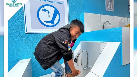 STUDENT tries the foot washing station in Dagadag Elementary School in Benguet.