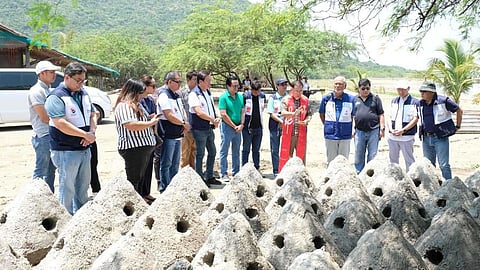 RC Makati officers, with a local priest officiating in the blessing of reef buds before these are dropped in Sulvec, Narvacan, Ilocos Sur. This is part of the Club's Save Our Reefs project in the area. An additional 60 reef buds were cast, bringing the total to 340 reef buds. In the photo are (front row, from left) Rotarian Paolo Turno, two United Philippine Leaf Inc. female employees, RC Makati treasurer Tetu Garcia, UPLI president and RC Makati director, Winston Uy, Narvacan Mayor Pablito Sanidad, a local priest from Narvacan, RC Makati president Bing Matoto, and Rotarians Benjie Tayag, Philip Soliven and Andy Mañalac.