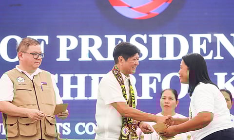 President Ferdinand ‘Bongbong’ Marcos Jr. led the recent distribution of various aids to almost 12,000 El Niño affected farmers, fisherfolks, and their families in the CARAGA region. At left is Agriculture Secretary Francisco Tiu Laurel Jr.