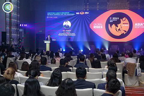 CLIMATE Change Commission vice chairperson and executive director Robert E.A. Borje (back) calls for enhanced risk avoidance measures at the Pan-Asia Risk and Insurance Management Association Conference.