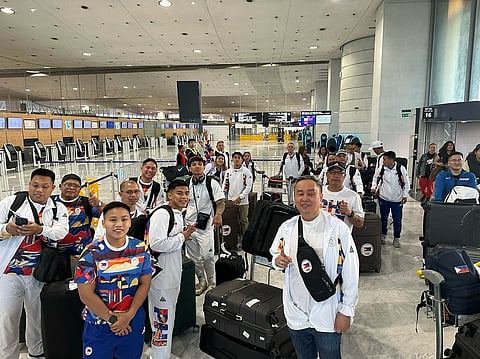 Philippine Olympic Committee president Abraham ‘Bambol’ Tolentino (right) and some members of Team Philippines arrive safely at the Charles de Gaulle Airport on Sunday ahead of the Paris Olympics next month.