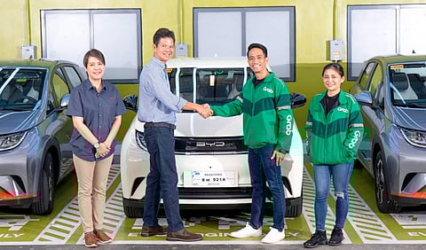 Grab and BYD Cars Philippines forge a partnership for a pioneering study on the inclusion of electric vehicles in the ride-hailing fleet. (From left) ACMobility Head of Retail & Distribution Toti Zara, BYD Cars Philippines Sales Director Minnie Bustamante, Grab Philippines Head of Mobility EJ dela Vega and Head of Mobility Marketplace Clarize Morito.