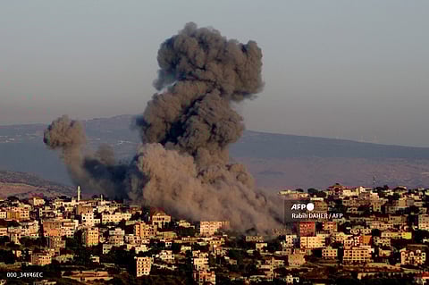 Black smoke billows following an Israeli air strike that targeted a house in the southern Lebanese village of Khiam near the Lebanese-Israeli border on June 21, 2024, amid ongoing cross-border clashes between Israeli troops and Hezbollah fighters.
UN Secretary-General Antonio Guterres warned on June 21, that fighting between Israel and Hezbollah must not turn Lebanon into "another Gaza."
