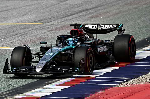 GEORGE Russell tries to ‘sneak through’ leaders Max Verstappen and Lando Norris in the sprint race of the Austrian Grand Prix.