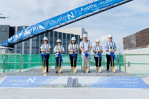 (FROM left) Cherie Fernandez, president and chief operating officer of SharePro Inc. and Dreambuilders Pro Inc.; Chiqui Huang, president and CEO of Filinvest Development Corporation; Catherine Ilagan, president and CEO of Filinvest Alabang Inc.; Tristan Las Marias, president and CEO of Filinvest Land Inc.; Daphne Sanchez, senior vice president for Residentials and Estate of Filinvest Alabang Inc.; and Don Ubaldo, first vice president for Townships of Filinvest Alabang Inc. led the recent topping off ceremony of Studio N in Filinvest City.