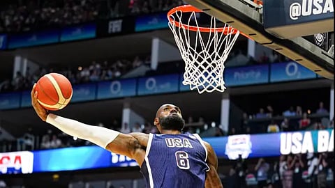 LeBron James rises to the occasion anew as Team USA squeaks by South Sudan, 101-100, in a Paris Olympics warmup game Saturday in London.