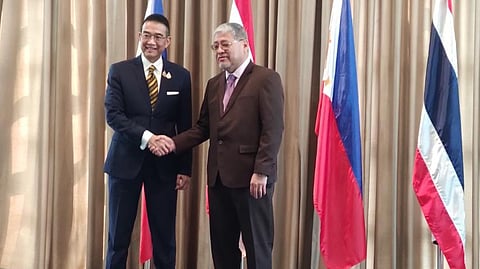 Thailand's Foreign Minister Maris Sangiampongsa and the Philippines' Foreign Affairs Secretary Enrique Manalo