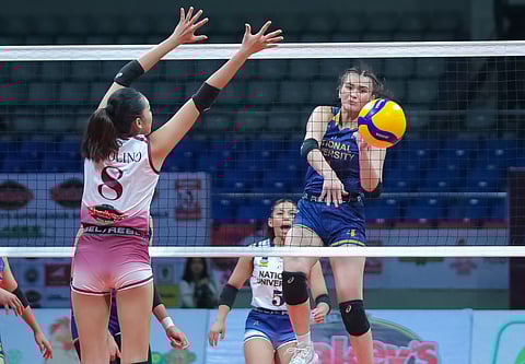 BELLA Belen (right) of National University delivers a powerful attack against Enderun Colleges during their 2024 Shakey’s Super League National Invitationals game. The Lady Bulldogs prevailed, 25-19, 25-15, 25-16.