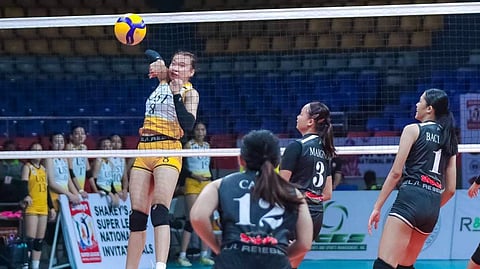 MARGA Altea of UST catches the Team Soccsksargen defense napping to score an easy attack during their SSL National Invitationals at the Ninoy Aquino Stadium. The Tigresses prevailed, 25-17, 25-18, 28-30, 25-14.
