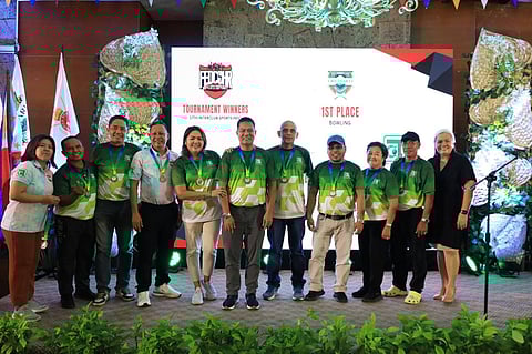 Members of the Orchard Gold & Country Club Bowling Team pose with their medals after winning the Bowling Event at the 2024 FEDCOHR Interclub Sports Fest held at the Alabang Country Club.