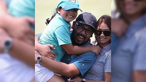 DENISE Eliana Mendoza celebrates with her parents after winning her Girls 8-9 title in the JPGT Mindanao Series.